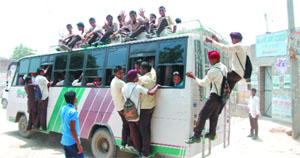 The overcrowding in buses endangers the lives of the passengers.