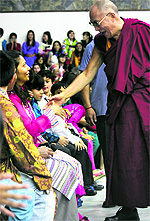 The Dalai Lama meets the audience at Woodstock School in Mussoorie on Sunday