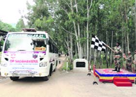 A bus carrying schoolchildren as part of Operation Sadbhavana being flagged off