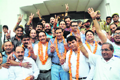Newly elected office-bearers of the Raghunath Bazaar Businessmen Association in a jubilant mood in Jammu on Sunday.