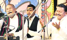 Wadali Brothers perform at the 53rd anniversary of Doordarshan in Jalandhar on Saturday night.