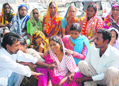 Wailing family members of Ram Bahadur, who was killed after being hit by a CTU bus in Chandigarh on Monday.