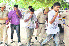 The accused in police custody in Panchkula on Monday. 