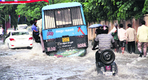 Waterlogged Raipur Road after a heavy downpour in Dehradun on Monday. Tribune photo: Vinod Pundir