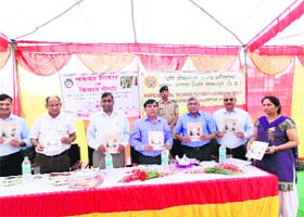 A book on mushroom cultivation is released by Deputy Commissioner KR Bharti on the occasion of maize day in Kangra on Monday