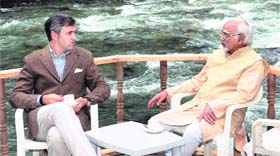Chief Minister Omar Abdullah interacts with Vice-President Mohammad Hamid Ansari during their visit to the Wildlife National Park at Dachigam near Srinagar.
