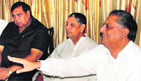 Senior Congress leader Rana KP (extreme right) along with MLAs Surinder Dawar (extreme left) and Rakesh Pandey (centre) during the party meeting at Circuit House in Ludhiana on Monday.