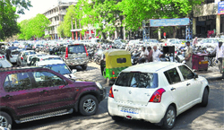 Vehicles parked haphazardly at the CMC parking lot at Sector 17 in Chandigrah. tribune photo: manoj mahjan