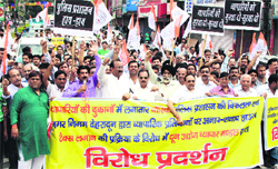 Traders who observed a bandh take out a procession in support of their demands in Dehradun on Tuesday. Tribune photo: Vinod Pundir