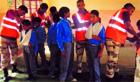 Members of a national disaster management team give training to students in Hamirpur.