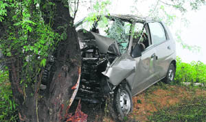 The ill-fated car that hit a tree killing three persons near Bhima village in Sirsa. 