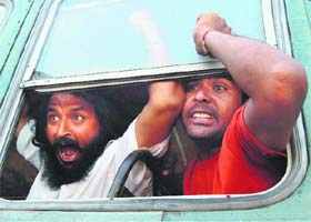 Protesting members of the unemployed linemen union being taken away by the police in Khadur Sahib