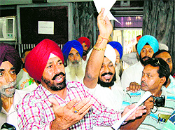 the newly elected Congress councillors stage a walkout from the MC office after the ceremony in Amritsar on Wednesday