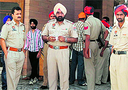 Police officials investigate the suicide of a youth in Ranjit Avenue in Amritsar on Wednesday