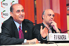 Federation of Indian Chambers of Commerce & Industry president R.V. Kanoria (L) with FICCI vice president Sidharth Birla addressing a press conference on 'Reforms - The Way Forward' in New Delhi on Wednesday.