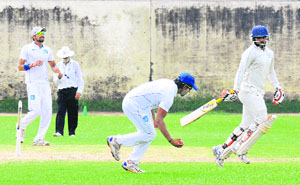 Players in action during a match between Reliance and the State Bank of Hyderabad during the JP Atray tournament in Chandigarh on Wednesday.