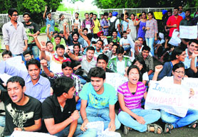 Students of the University Institute of Chemical Engineering and Technology protest at the PU in Chandigarh on Wednesday.