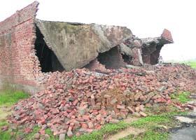An illegal building demolished by the District Town Planning Department in Kurukshetra on Tuesday