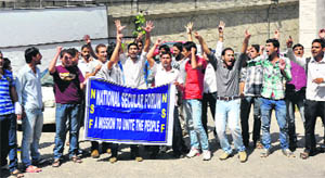 Medical students protest outside the office of Jammu Health Director on Wednesday.  