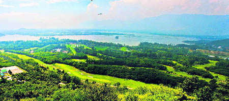 A scenic view of Royal Springs Golf Course in Srinagar.
