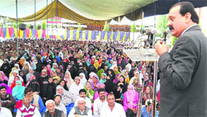 The Minister for Industries and Commerce, S.S. Slathia, addresses a gathering at Bagh-e-Ali Mardan Khan on Wednesday in Srinagar. 