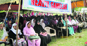 Participants listen to speakers at the NRHM samelan at Lolab in Kupwara on Wednesday.