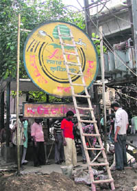 Ahead of the mayoral election, a signboard being redone near the MC Zone-A office in Ludhiana on Wednesday.