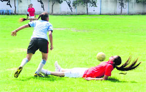 A match in progress in the Inter School Zonal Football Tournament at BVM Senior Secondary School, Kitchlu Nagar, Ludhiana, on Wednesday.
