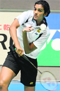 Indias PV Sindhu returns to Kaori Imabeppu of Japan during their first round match at the Japan Open in Tokyo. Sindhu won 21-18, 17-21, 21-13.  AFP