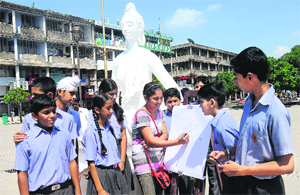 Students of Dikshant International School, Zirakpur, organise a signature campaign on the eve of International Peace Day at Sector 17 in Chandigarh on Thursday. 
