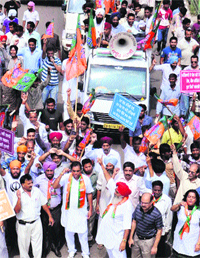Members of the BJP hold a protest in Mohali on Thursday. 
