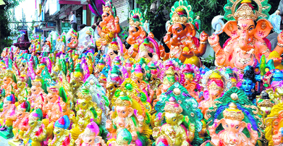 Idols of Lord Ganesha on display for sale at the Chandracharya intersection made by Rajasthani artistes as part of the ongoing Ganpati Mahotsava in Haridwar.