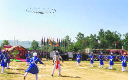 Nihangs display gatka during the Army mela in Nowshera on Thursday. A Tribune photograph