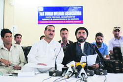 Lok Janshakti Party state president Sanjay Saraf; (right) J&K Welfare Association chairman Mohammad Farooq Khan address mediapersons in Srinagar on Thursday. Photo: Yawar Kabli