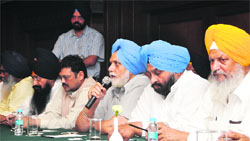 Janmeja Singh Sekhon (third from right), Cabinet Minister and observer for the Mayoral election, addresses SAD councillors and leaders during a meeting in Ludhiana on Thursday. Tribune Photo Himanshu Mahajan
