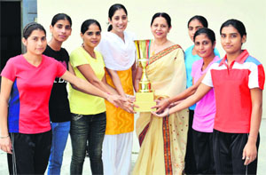 The team of Khalsa College for Women poses for a photograph after winning the Inter-College Cross Country Tournament held at Guru Nanak Dev University