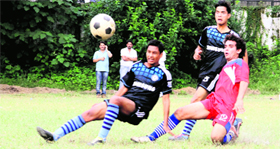 A match in progress during the Dehradun District Football League in Dehradun on Friday.