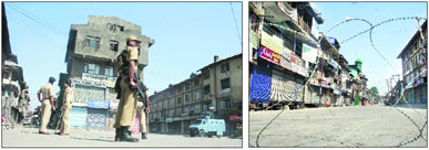 Security men guard the Lal Chowk area during a shutdown call given by various groups against the anti-Islam film; and (right) An area in the city centre being fenced off to ward off protesters in Srinagar on Friday.