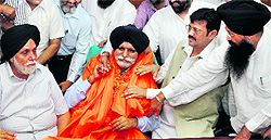 Akali-BJP leaders greet the newly elected Mayor, Harcharan Singh Gohalwaria, in Ludhiana on Friday