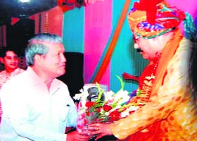 Pauri Garhwal MP Satpal Maharaj being felicitated by Haridwar MP Harish Rawat at a religious function in Haridwar on Saturday