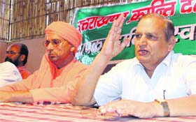 BD Raturi, central president fo the UKD (Jantantrik), along with party candidate for the Tehri Lok Sabha bypelection Yogi Rakesh Nath addresses a press conference in Dehradun on Saturday