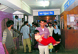 A patient being taken to a hospital in Baramulla in the Tangmarg area on Saturday