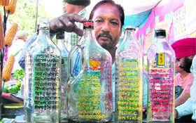 Sukhwinder Singh displays his work in Ludhiana.