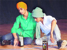 Students enact a play during a seminar organised by the Manav Adhikar Sangharsh Committee at Virsa Vihar in Amritsar on Sunday. 