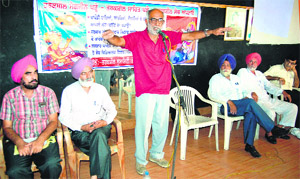 President of the Federation of Indian Rationalists Associations Dr Narendra Nayak speaks at a seminar in Amritsar on Sunday. 
