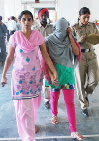 A file photo of Namdeek Kaur being taken to the court.