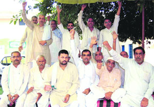 Farmers, under the aegis of the Bharatiya Kisan Union, stage a protest in Haridwar on Sunday. 