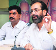 Senior BJP leader Munna Singh Chauhan addresses a press conference in Dehradun on Sunday. 