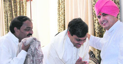 Saket Bahuguna seeks the blessings of Mahant Devender Dass of Guru Ram Rai Darbar in Dehradun on Sunday. 