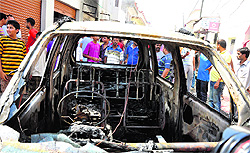 One of the cars which was destroyed in a cylinder blast